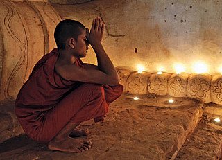 Praying Monk in Burma