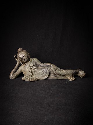 Oude bronzen liggende Boeddha