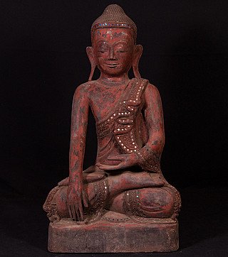 Oude houten Mandalay Boeddha